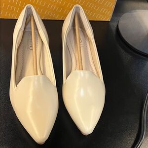 Elegant Cream Flats by Miu Miu